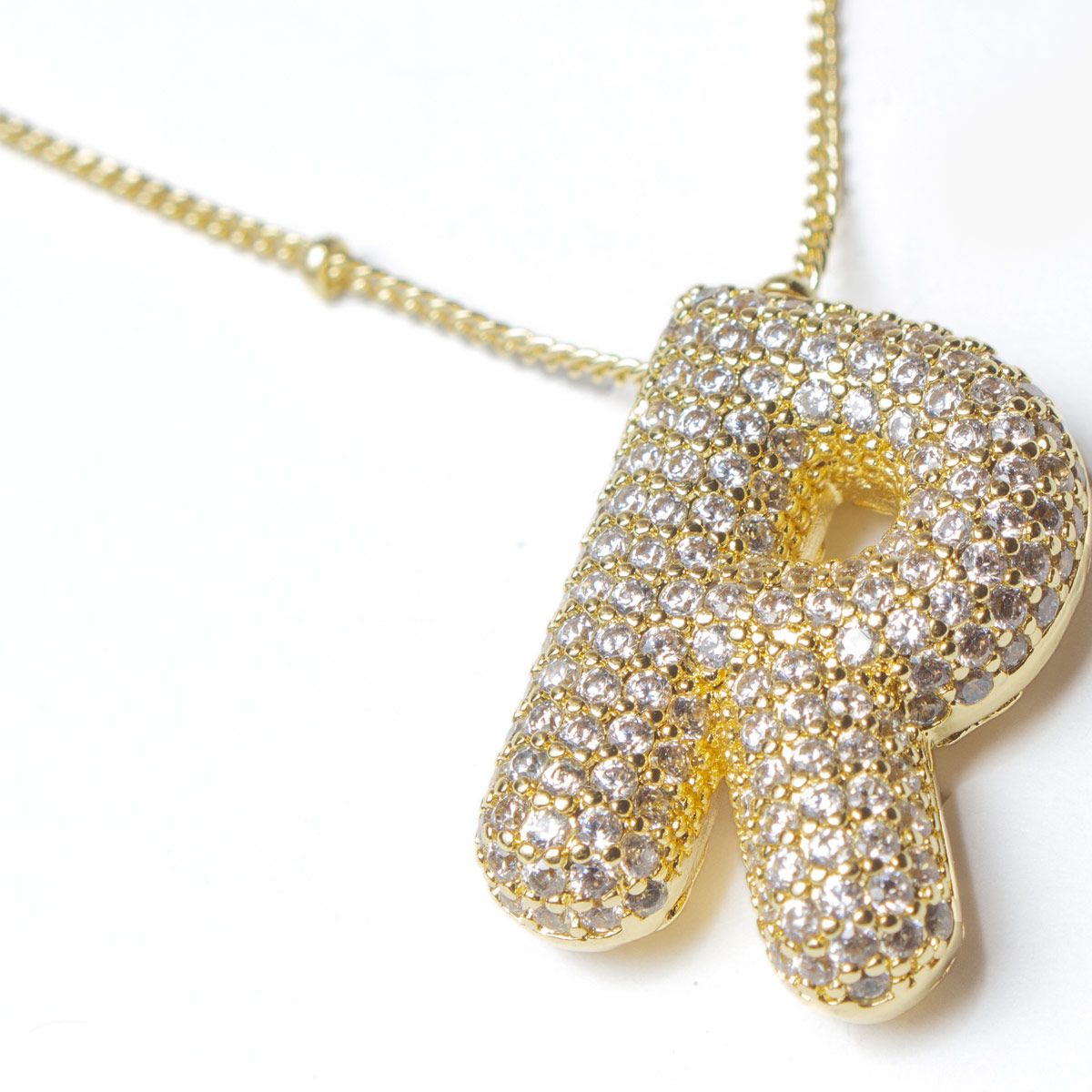 Collar Dorado de Cobre y Zirconia Letra R Vstone image number null